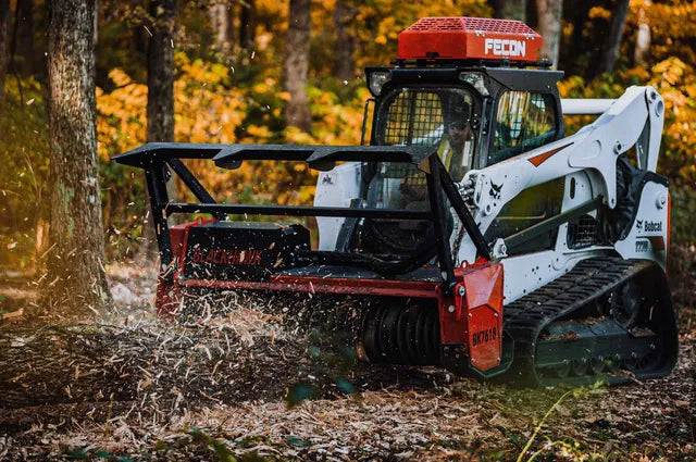 white and black color fecon truck machine 